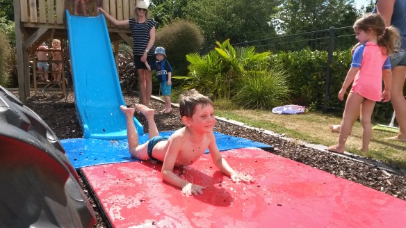 Today playcentre was back on for Naomi but Milo's school hadn't yet started, so big brother came back to playcentre.  A hot day, we made a water slide, fantastic fun for all.